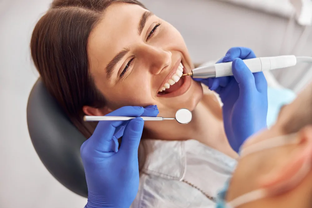 Woman smiling after dental bonding procedure