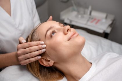 Woman receiving facial rejuvenation treatment